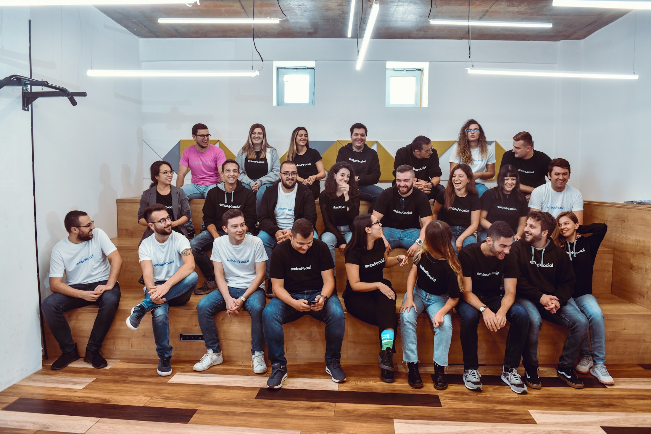 A team gathering in a modern collaborative setting